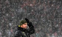 Fussball 1. Bundesliga : Trainer Juergen Klopp im Schneetreiben (Borussia Dortmund)