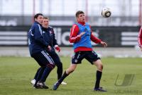 Fussball 1. Bundesliga : Mark van Bommel mit Thomas Mueller (v. li., FCB)