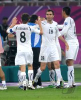 Fussball AFC Asian Cup 2011 Eroeffnungsspiel:  Server Djeparov, Timur Kapadze, Anzur Ismailov (v. li., Uzbekistan)