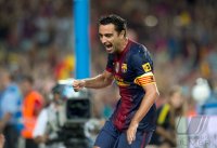 FUSSBALL Primera Division/Super Cup 2012: JUBEL Xavi Hernandez (Barca)