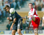 Fussball 1. Bundesliga: Koeln - Wolfsburg, Zweikampf