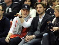 Basketball 1. Bundesliga 2011/2012: Bastian Schweinsteiger , Sportdirektor Marko Pesic (v. li., FC Bayern Muenchen)