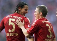 Fussball 1. Bundesliga, Saison 2011/2012:  JUBEL nach dem Tor ,  Daniel van Buyten , Bastian Schweinsteiger (v. li. FC Bayern Muenchen)