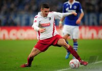 Fussball: 1. Bundesliga Saison 2010/2011: SC Freiburg, CALIGUIRI am Ball