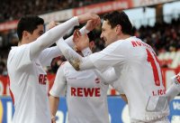Fussball 1. Bundesliga, Saison 2011/2012:  Jubel nach dem Tor zum 1:1 Milivoje Novakovic (re.) mit Odise Roshi (1. FC Koeln)