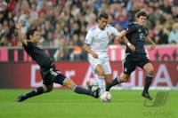 FUSSBALL Testspiel : Mark van Bommel (li, FC Bayern Muenchen) gegen CRISTIANO RONALDO (Real Madrid) gegen Nicolas Juellich (re, FC Bayern Muenchen)