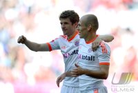 Fussball 1. Bundesliga, Saison 2011/2012:  Thomas Mueller (li.) mit Arjen Robben (FC Bayern Muenchen)