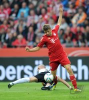 Fussball 1. Bundesliga : Elkin Soto (li, 1. FSV Mainz 05) gegen Thomas Mueller (re, FC Bayern Muenchen)