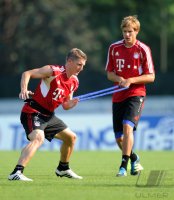 Fussball 1. Bundesliga Saison   2011/2012 : Bastian Schweinsteiger , Holger Badstuber (v. li., FC Bayern Muenchen)