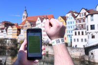 Tageszertifikat / Tagesticket in Form von einem Armband mit QR Code fuer Innenstadtbesucher in Tuebingen