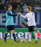 FUSSBALL INTERNATIONAL: Marco REUS (Deutschland) und Torwart Manuel NEUER (Deutschland)