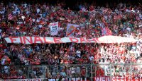 Fussball 1. Bundesliga, Saison 2011/2012: FC Bayern Muenchen Fankurve mit einem Banner FINALE DAHOAM