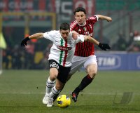 FUSSBALL SERIE A:  Simone Padoin (li, Juventus Turin) gegen Mark Van Bommel (AC Mailand)