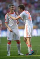 Fussball 1. Bundesliga, Saison 2011/2012:  Bastian Schweinsteiger (li.) mit Thomas Mueller (FC Bayern Muenchen)