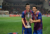 Fussball UEFA SUPER CUP 2011: JUBEL Pedro Rodriguez  (Barca) und David Villa (Barca) mit Pokal