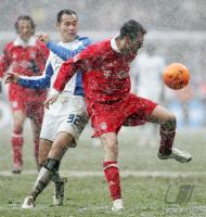 Fussball 1. Bundesliga: Bayern Muenchen - Hamburger SV, Zweikampf