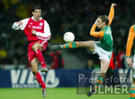 Fussball 1. Bundesliga: Bremen - Bayern, Zweikampf