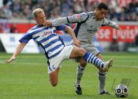 Fussball 1. Bundesliga: MSV Duisburg - FC Schalke 04, Zweikampf