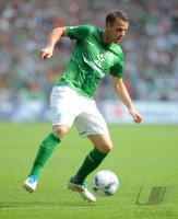 Fussball 1. Bundesliga, Saison 2011/2012: Werder Bremen, SCHMITZ am  Ball