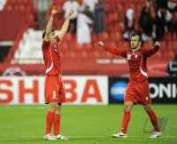Fussball AFC Asian Cup 2011: Jubel Hadi Aghily, Mohammad Nosrati (v. li., Iran)