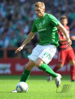 Fussball 1. Bundesliga, Saison 2011/2012: Werder Bremen, HUNT am  Ball
