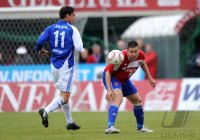 Fussball 3. Bundesliga : Sebastian Haehnge (li, FC Carl Zeiss Jena) gegen Torben Hoffmann  (re, Unterhaching)