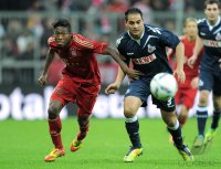 Fussball 1. Bundesliga, Saison 2011/2012:  David Alaba (li, FC Bayern Muenchen) gegen Ammar Jemal (1. FC Koeln)