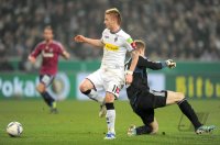 Fussball DFB Pokal 11/12 :  TOR zum 3:1 von Marco Reus (li, Borussia Moenchengladbach) gegen Lars Unnerstall (FC Schalke 04)