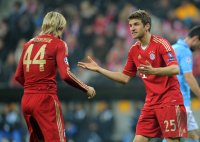 Fussball CHL  Saison 2011/2012:  Anatoliy Tymoshchuk, Torwart Manuel Neuer , David Alaba (v. li., FC Bayern Muenchen)