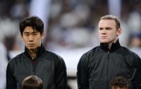 FUSSBALL INTERNATIONAL CHL ACHTELFINALE 12/13: Kagawa und  Rooney (beiden Manchester United FC)