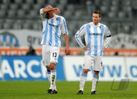 2. Fussball Bundesliga: Enttaeuschung bei Necat Ayguen  , Benjamin Lauth (v. li., 1860 Muenchen)