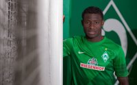 Fussball 1. Bundesliga, Saison 2012/2013, Werder Bremen: Joseph Akpalla im exklusiven Pressefoto ULMER Fotoshooting