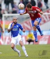 Fussball 3. Bundesliga : Orlando Smeekes (li, FC Carl Zeiss Jena) gegen Michael Stegmayer (re, Unterhaching)