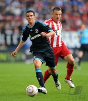 Fussball Supercup: Christoph Moritz (li, FC Schalke 04) gegen Ivica Olic (re, FC Bayern Muenchen)