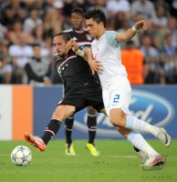 Fussball CHL  Saison 2011/2012:  Franck Ribery (li, FC Bayern Muenchen) gegen Jorge Teixeira (re, FC Zuerich)
