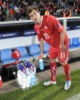Fussball U21-EURO 2011 FINALE: (v. li.) Schweiz Enttaeuschung nach der Niederlage, Admir Mehmedi (Schweiz) mit einer Trinkflasche