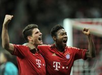 Fussball 1. Bundesliga, Saison 2011/2012:  JUBEL Mario Gomez (FC Bayern Muenchen) und David Alaba (FC Bayern Muenchen)