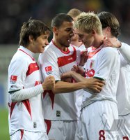 2. Fussball Bundesliga : JUBEL mit Moritz Leitner, Marcel Ndjeng, Axel Bellinghausen (v. li., FC Augsburg)