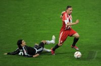 Fussball 1. Bundesliga : Almong Cohen (li, 1 FC Nuernberg) gegen Franck Ribery (re, FC Bayern Muenchen)