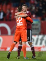 Fussball 1. Bundesliga, Saison 2012/2013: Jubel nach dem Sieg mit Per Nilsson und  Torwart Patrick Rakovsky  (v. re.,1 FC Nuernberg)