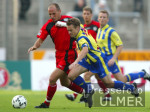 Fussball - DFB-Pokal: Braunschweig - Reutlingen, Zweikampf
