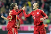 Fussball 1. Bundesliga, Saison 2011/2012: Thomas Mueller , Arjen Robben (v. li., FC Bayern Muenchen)