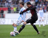 2. Fussball Bundesliga:  Benjamin Lauth (li, 1860 Muenchen) gegen Malte Metzelder (re, FC Ingolstadt )