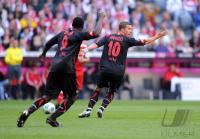 Fussball 1. Bundesliga : Lukas Podolski (Koeln)  re, Manasseh Ishiaku