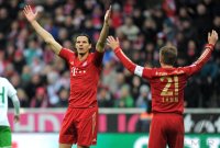 Fussball 1. Bundesliga, Saison 2011/2012: Daniel van Buyten, Philipp Lahm (v. li., FC Bayern Muenchen)