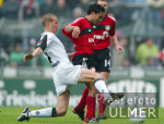Fussball 1. Bundesliga: Gladbach - Leverkusen, Zweikampf