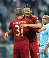 Fussball CHL  Saison 2011/2012:  Bastian Schweinsteiger, Martin Demichelis (v. li., FC Bayern Muenchen)