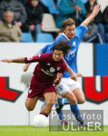 Fussball 1. Bundesliga: Bochum - Lautern, Zweikampf