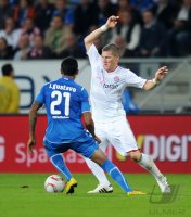 Fussball 1. Bundesliga : Luiz Gustavo Dias (li, TSG 1899 Hoffenheim) gegen Bastian Schweinsteiger (re, FC Bayern Muenchen)