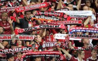 Fussball 1. Bundesliga, Saison 2011/2012:  1 FC Nuernberg Fans mit Schal